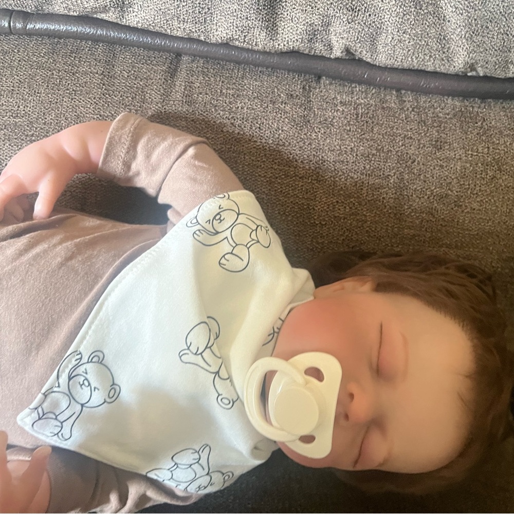 Newborn boy realistic looking